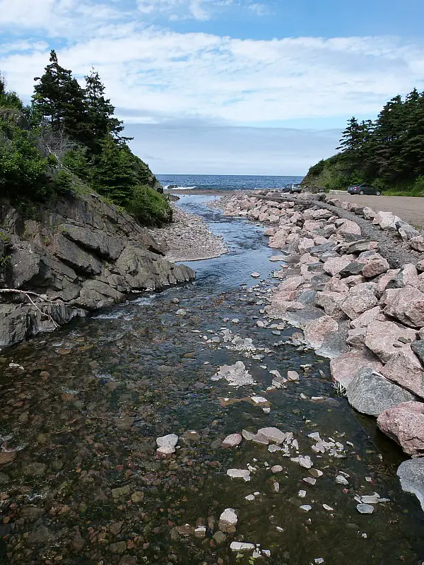 River running to the sea in Meat Cove on Cape Breton Island, Nova Scotia