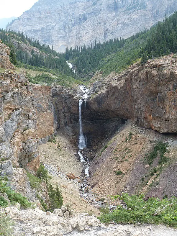 View to a waterfall on the Crypt Lake Trail in Waterton Lakes National Park, Canada
