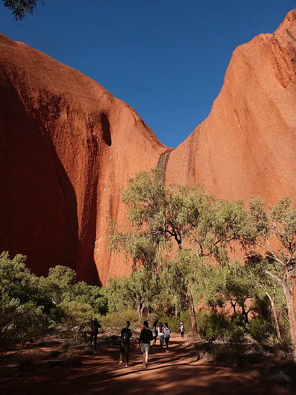Hiking the base walk around Uluru in the Australian Outback