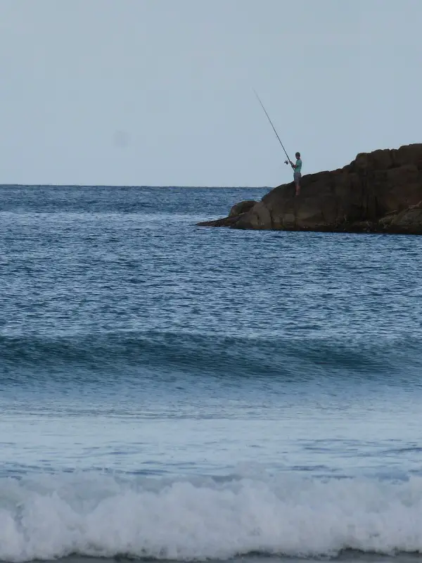 Fisherman at One Mile Beach in Nelson Bay