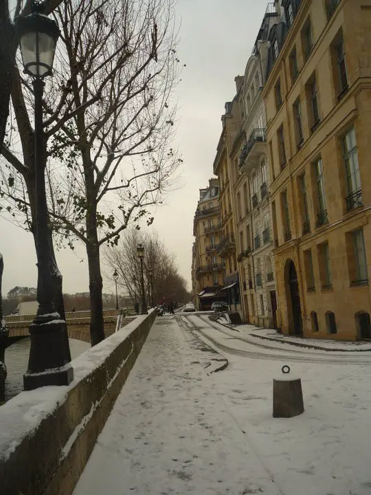 Snowy Paris by the Seine