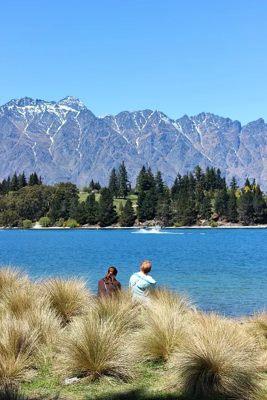 Sitting by the lake in Queenstown, in the Otago Region of New Zealand