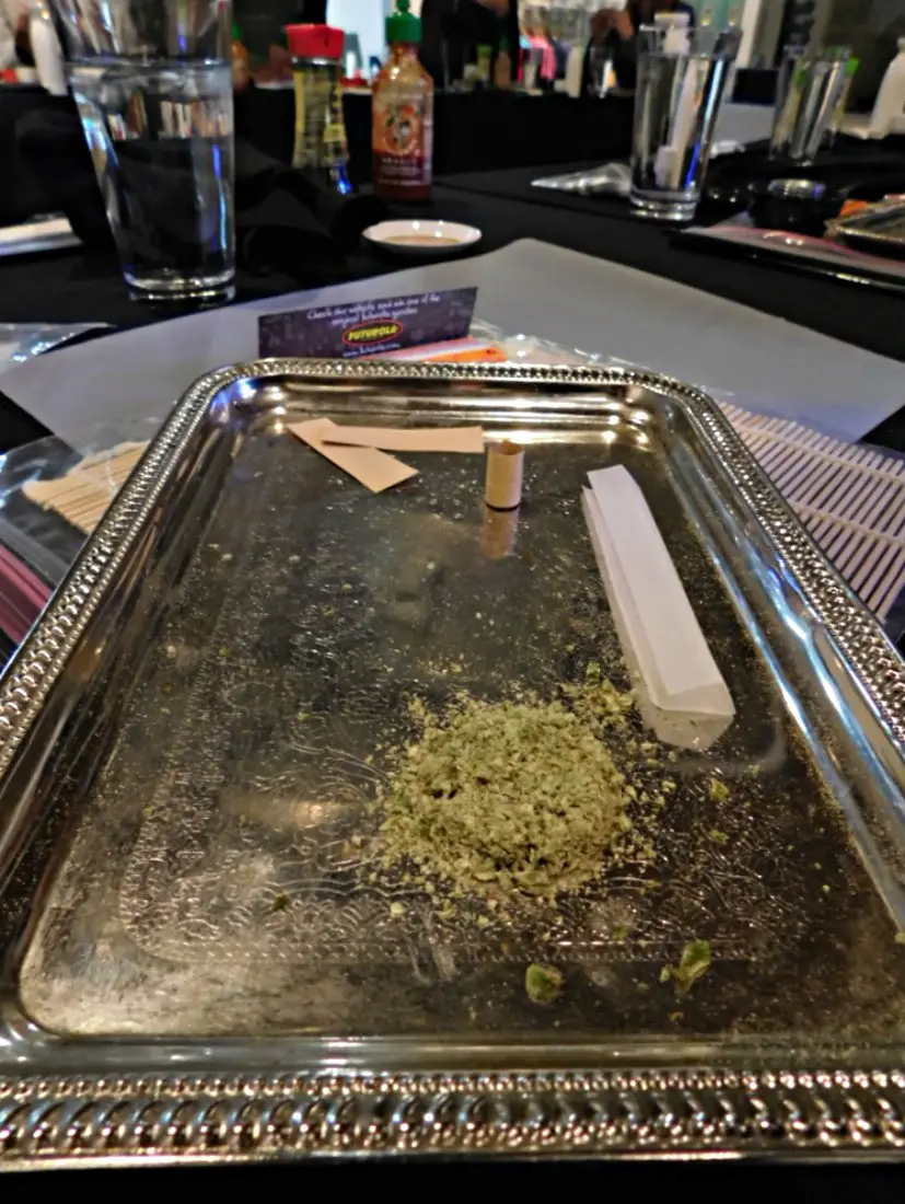 Learning how to roll joints at a sushi and joint rolling class with My 420 Tours - leaders in Cannabis Tourism in Denver