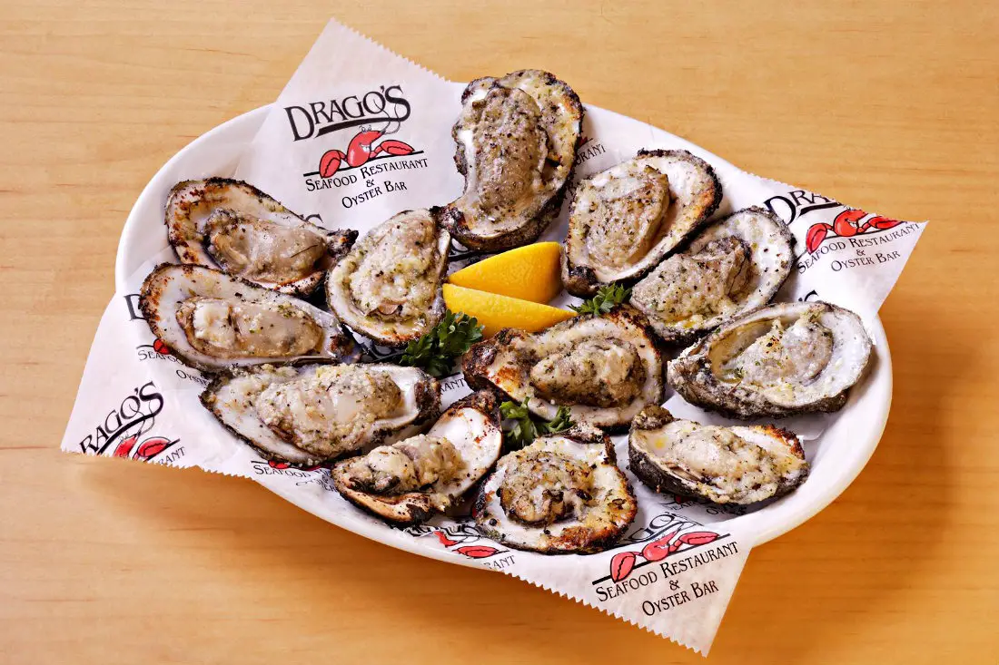 Eating charbroiled oysters at Drago's in New Orleans is a top Louisiana food experience