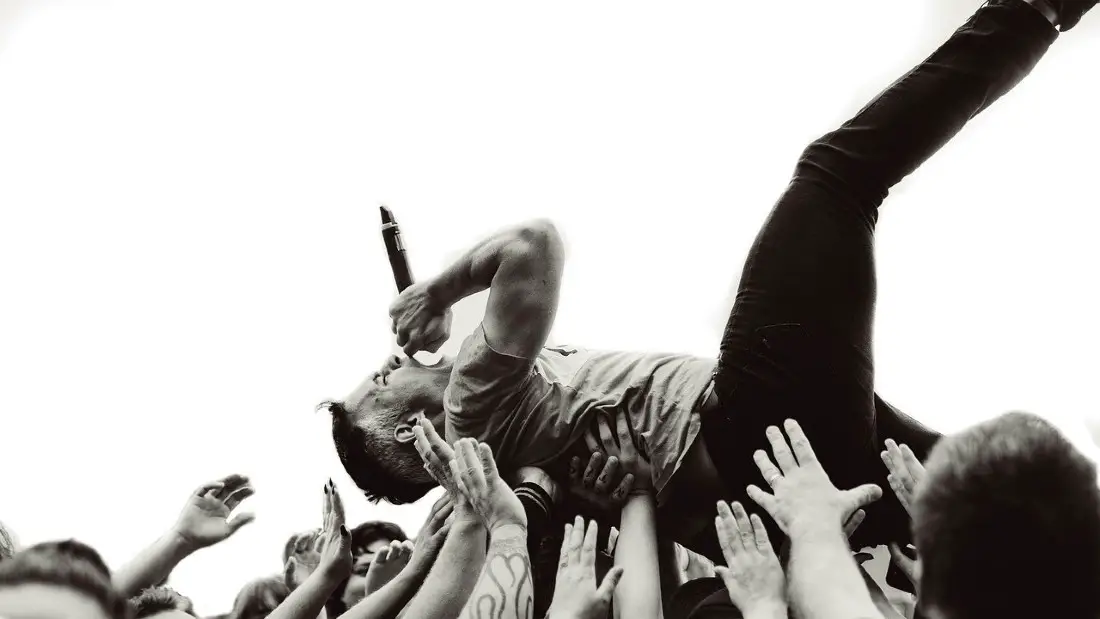Crowdsurfing at music festival